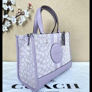 $300 
#LimitedEdition Soft Lilac Dempsey Coach call or text me at (707)301-6184